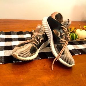 Adidas Women Size 9.5. Great breathable running shoe. Lots of life left!